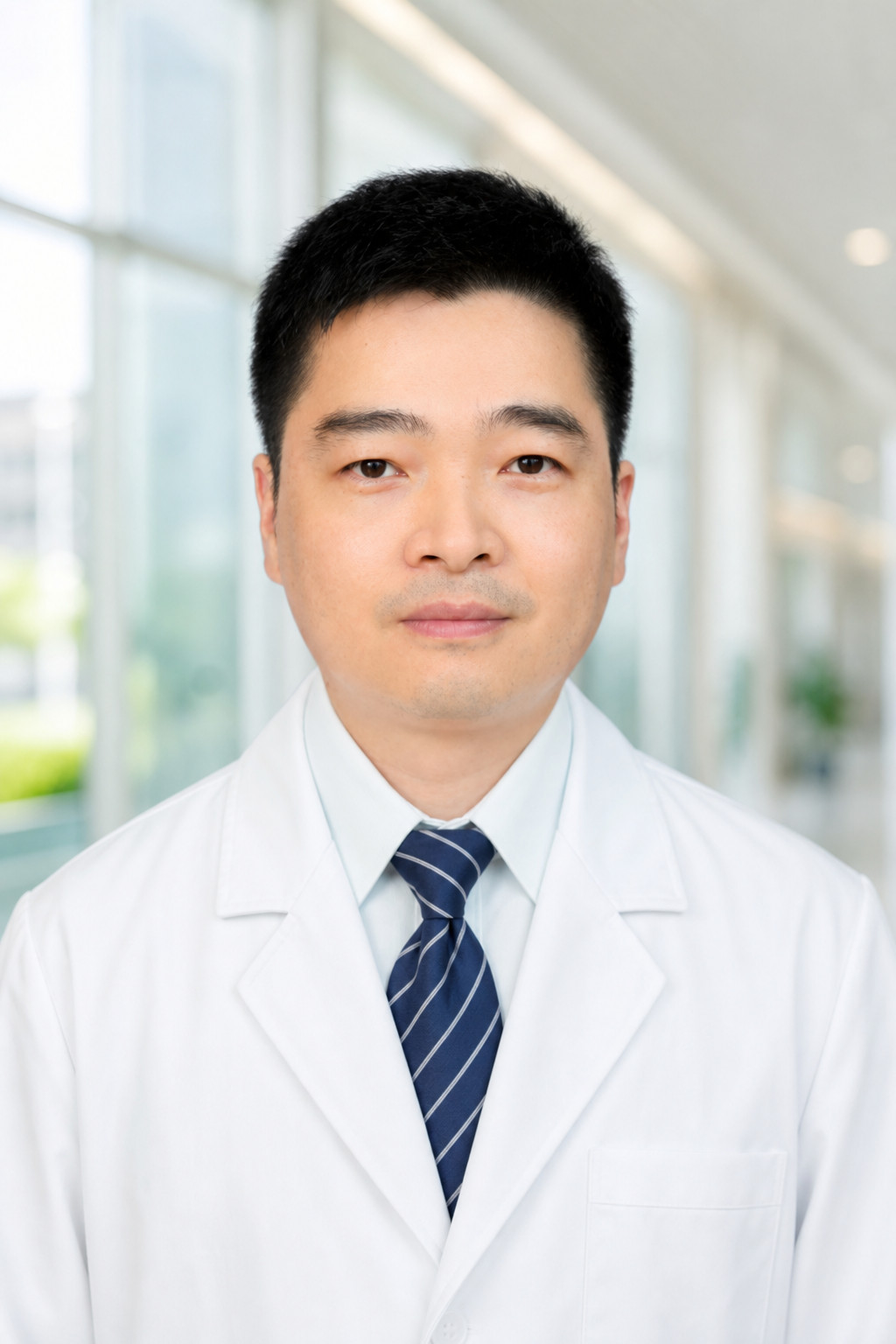 Professional portrait of Dr. Ju Li