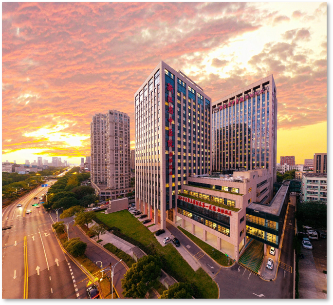 Modern clinical campus exterior at sunset